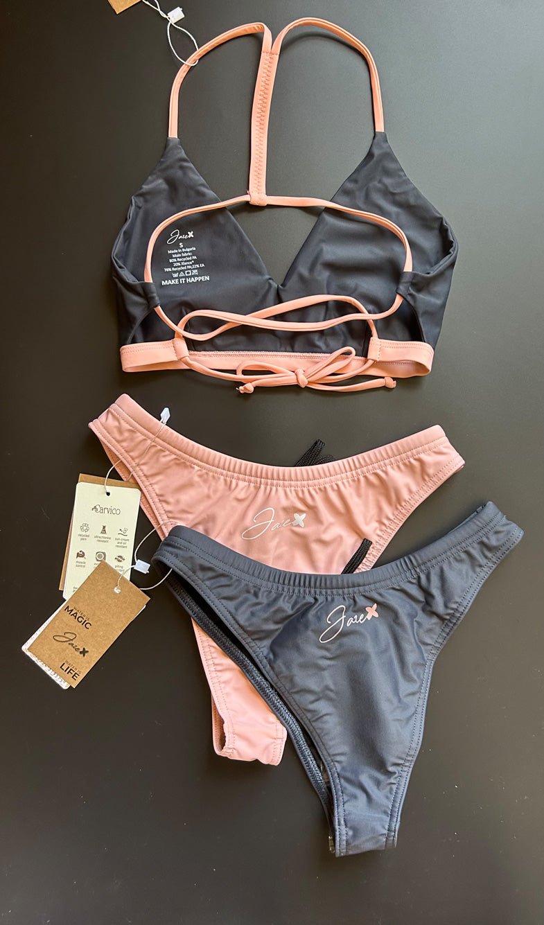 The Arya Bikini Top by Jaze shown from the back comes with thin, pink stripes and can be combined with our midnight or sunrise bikini bottom.