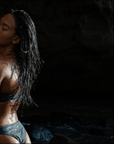 Image of our gift voucher with our Model wearing the midnight bikini bottom.