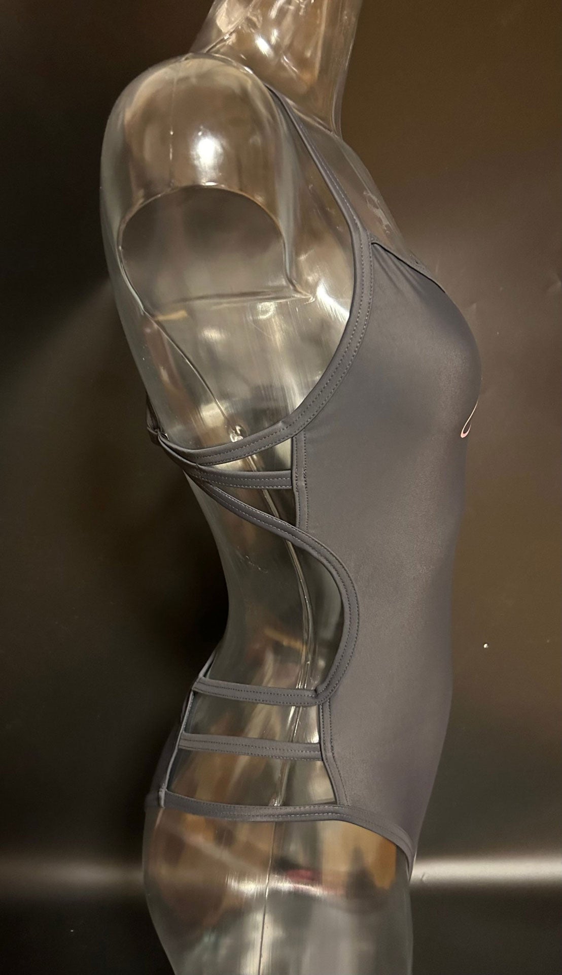 Hailey One-Piece Swimsuit displayed on a mannequin, slightly turned to the side, highlighting the detailed design and fabric quality.