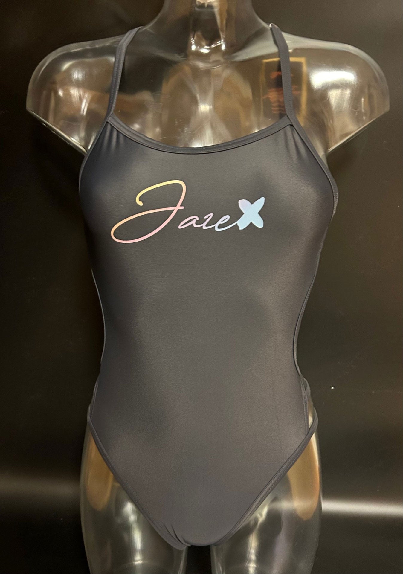 Front view of the Hailey One-Piece Swimsuit displayed on a mannequin, showcasing the streamlined fit and clean design.