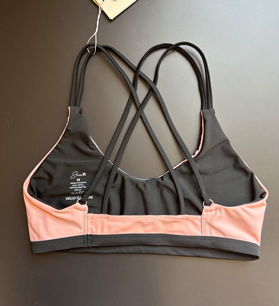 Back view of the Sunshine Bikini Top on a black background, showing the secure fit and stylish strap design.