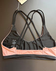 Back view of the Sunshine Bikini Top on a black background, showing the secure fit and stylish strap design.