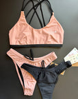 Sunshine Bikini Top styled with both Sunrise and Black Bikini Bottoms, displayed on a black background for a versatile swimwear look.