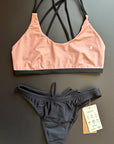 Sunshine Bikini Top paired with a Black Bikini Bottom, displayed on a black background, emphasizing a classic swimwear combination.