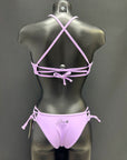 Back view of the Jaze Ariel lavender bikini bottom on a mannequin, showcasing cheeky cut and durable eco-friendly fabric.