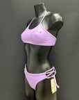 Jaze Ariel bikini bottom in lavender, side view on mannequin highlighting adjustable hip straps and secure fit for active women.