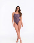 Model wearing Moonlight one piece swimsuit in clean studio front pose