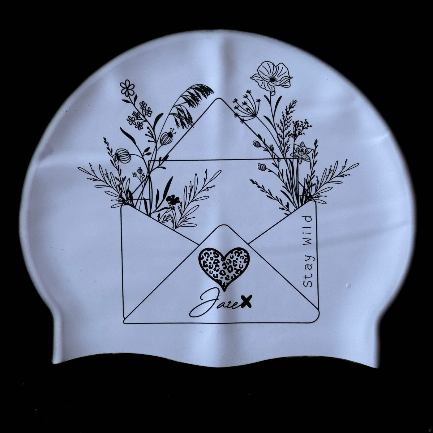 Jaze STAY WILD - Swim Cap in white with black hand drawn design in black.