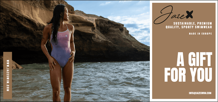 Image of our gift voucher with our Model standing on the beach and shown from the front, wearing the RAINBOW - One-Piece Swimsuit.