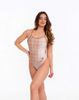 Model wearing Lana one piece swimsuit in clean studio front pose