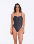 Front view of midnight one piece swimsuit highlighting high leg cut and minimal design