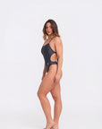 Side view of midnight one piece swimsuit emphasizing high cut leg and athletic fit